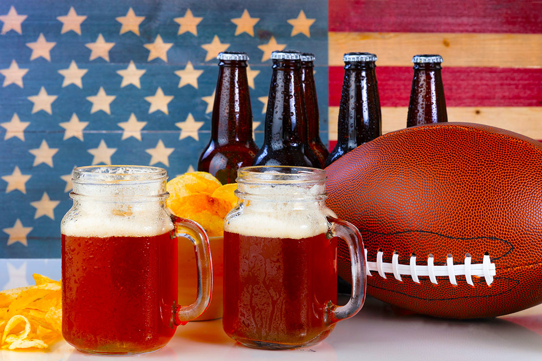 Patriotic beer and football graphic. 